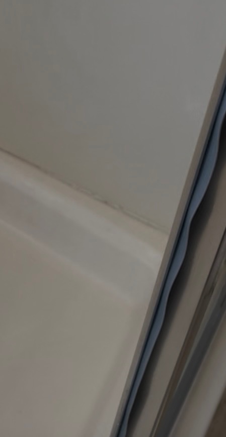Caulk & tub edge — after JNJ Cleaning Service