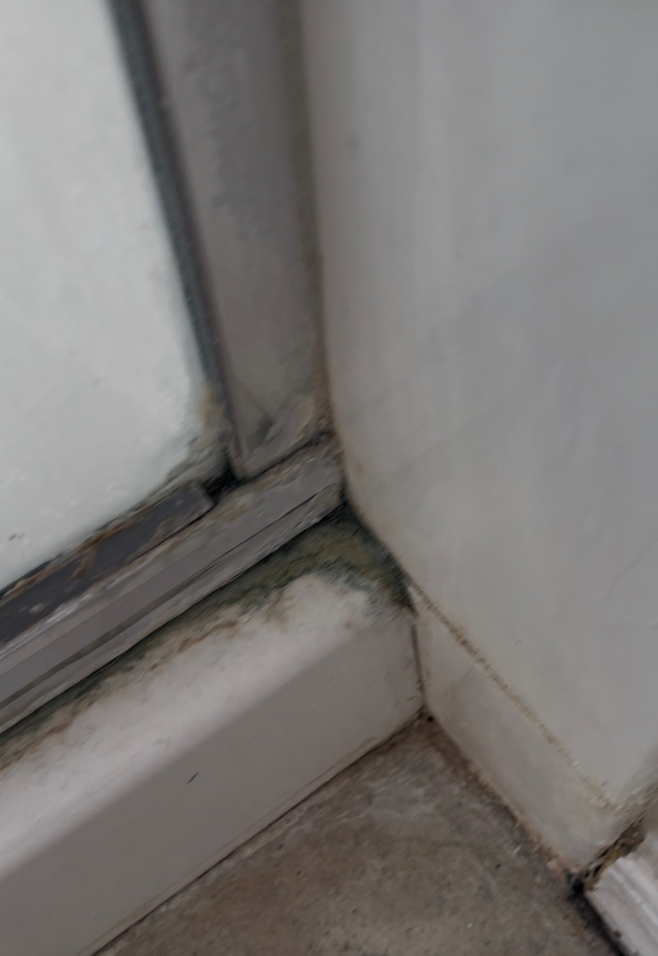 Sliding door track — before professional cleaning
