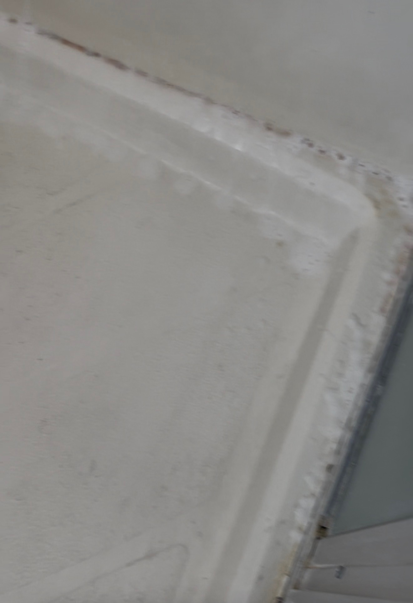 Caulk & tub edge — before professional cleaning